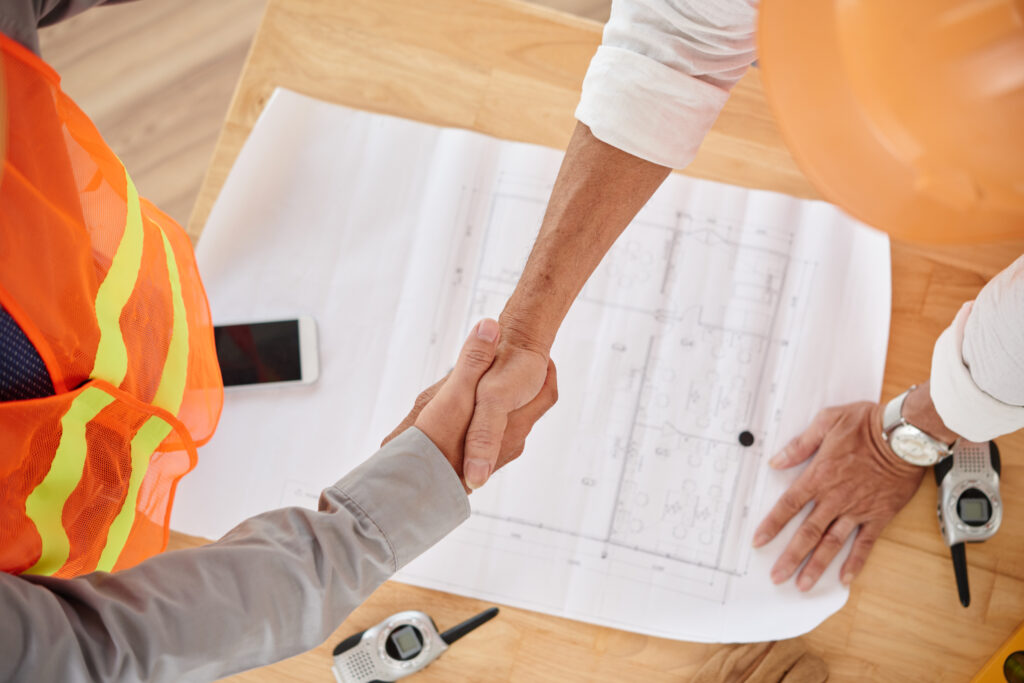 A handshake displays strong relationships in the construction industry